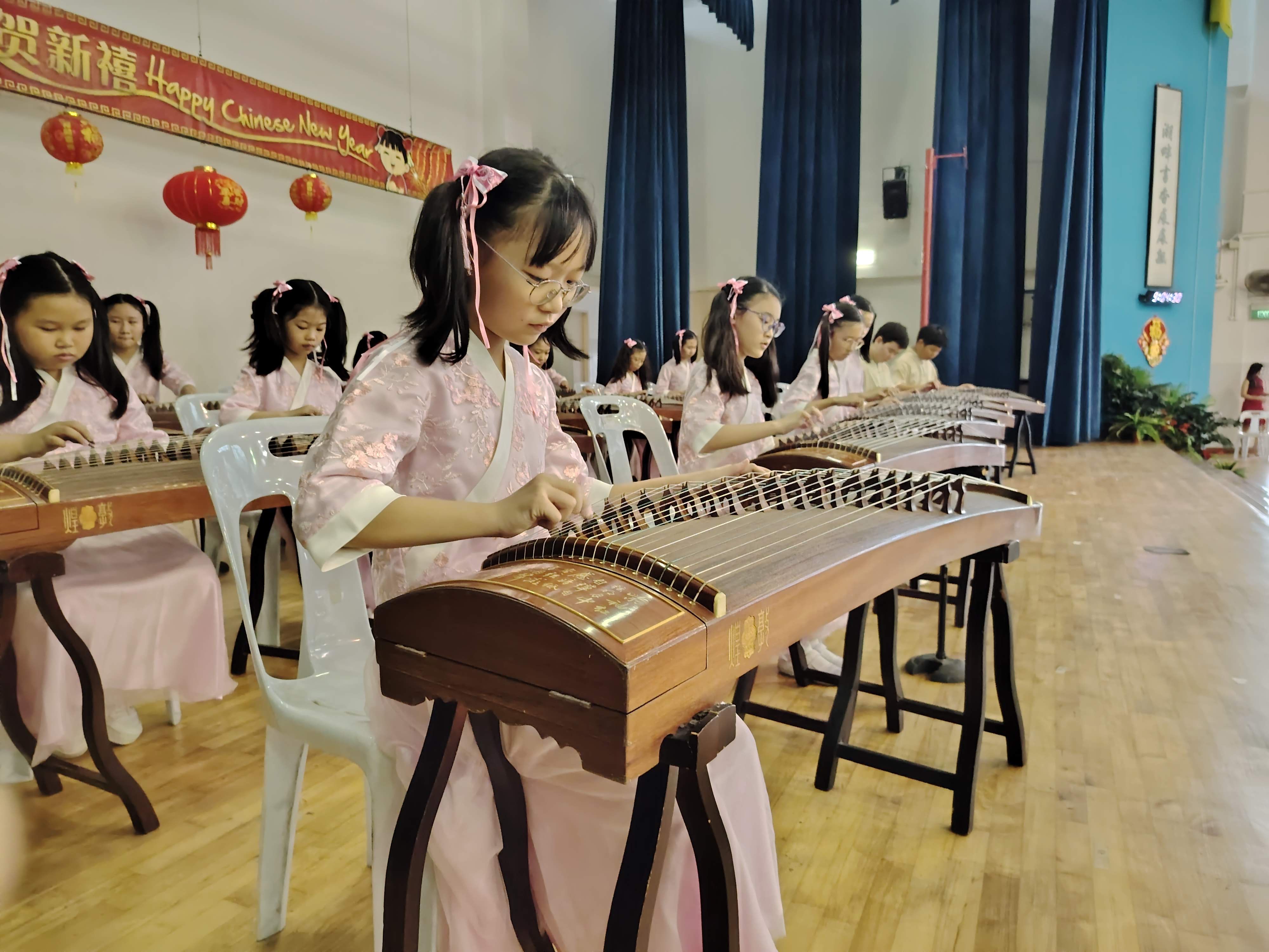Our students from the Guzheng CCA putting up a performance